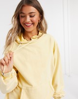 Thumbnail for your product : ASOS DESIGN oversized boyfriend hoodie in washed yellow