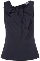 Carolina Herrera sleeveless blouse with front ruffle detail