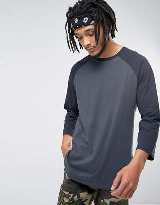 ASOS Relaxed Fit Raglan Long Sleeve T-Shirt With Curved Hem In