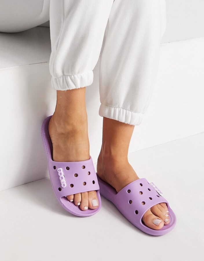 Crocs classic slide flat sandals in lilac - ShopStyle