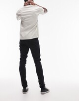 Thumbnail for your product : Topman stretch skinny jeans in black