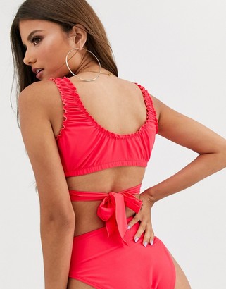 ASOS DESIGN DESIGN fuller bust exclusive plunge wrap short sleeve crop bikini top with frill edge in neon red dd