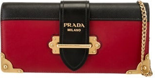 Prada Shoulder Bag Red City Calf Leather Antiqued Gold-Tone Hardware Saffiano Leather Trim Chain-Link Shoulder Strap Leather Lining & Single Interior Pocket Fold-In Flap Closure at Front Unfortunately, due to restrictions, this item may not be eligible for shipping in all areas.