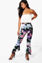 Thumbnail for your product : boohoo Bright Floral Dipped Hem Skinny Trousers
