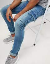 Thumbnail for your product : ASOS DESIGN Super Skinny Jeans In Mid Wash With Cargo Pockets