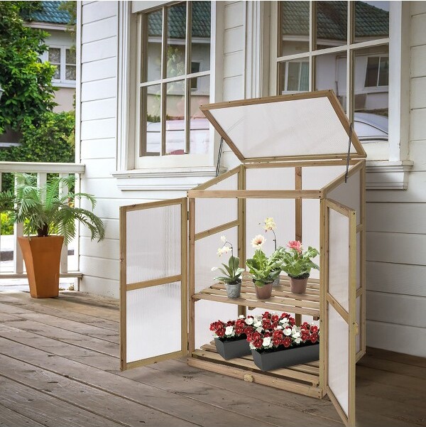 https://img.shopstyle-cdn.com/sim/f9/0a/f90a6a7f92bc73a6996d860d61eb3b19_best/costway-garden-portable-wooden-greenhouse-cold-frame-raised-plants-shelves-protection.jpg