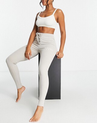 The Couture Club ribbed varsity leggings with lace up in cream co