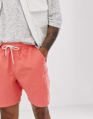 ASOS Design DESIGN slim shorts in washed pink with cargo pocket