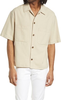 beige button up shirt