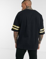 Thumbnail for your product : ASOS DESIGN festival oversized t-shirt with half sleeve and v neck in metallic gold