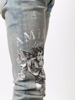 Thumbnail for your product : Amiri Cherub Print Jeans