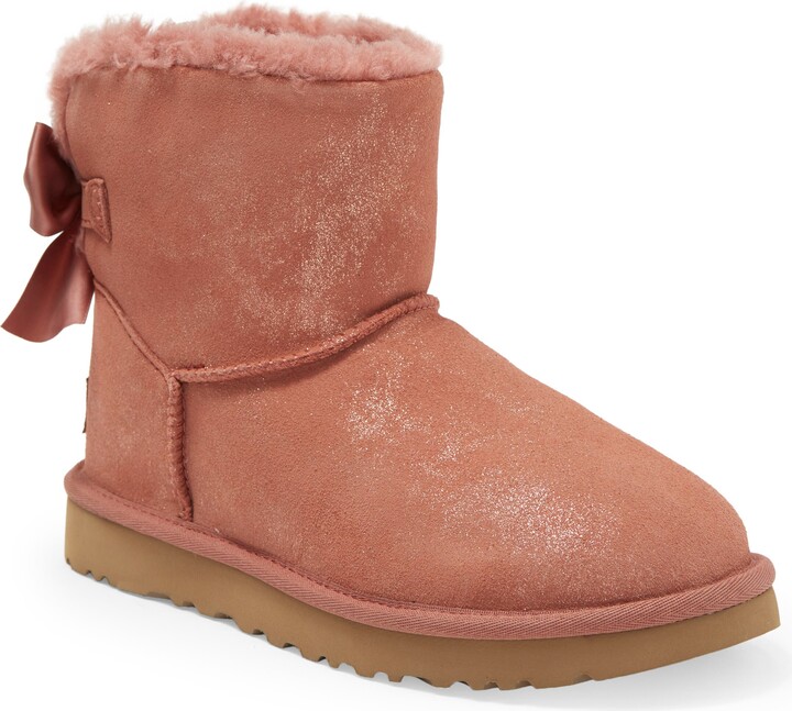 UGG Mini Bailey Bow Glimmer Faux Fur Lined Boot - ShopStyle