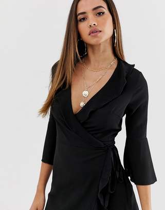 Outrageous Fortune ruffle wrap dress with fluted sleeve in black