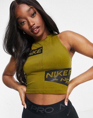 Nike Training Nike Pro Training crop top with logo taping in khaki -  ShopStyle