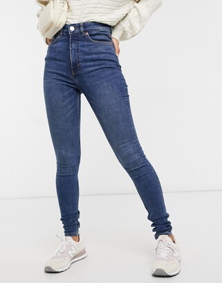 Monki Oki cotton skinny high waist jeans in new mid blue - MBLUE - ShopStyle