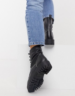 ASRA Exclusive Billie lace up flat boots with stitch detail in black leather