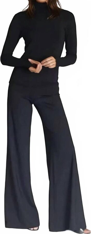 Buki Collagen Turtleneck In Classic Black