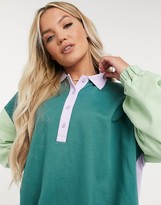 Thumbnail for your product : ASOS DESIGN oversized collared mini sweatshirt dress in sage and purple sleeve colour block