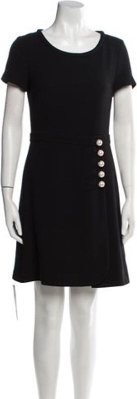 Boutique Moschino Virgin Wool A-Line Dress Black Short Sleeve with Scoop Neck Concealed Zip Closure at Back Size not listed, estimated from measurements.