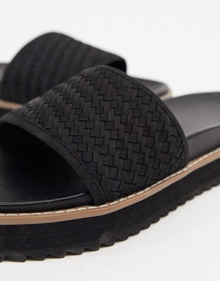 ASOS DESIGN sliders in leather with woven strap and chunky sole