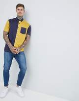 Thumbnail for your product : ASOS DESIGN regular fit cut & sew shirt in navy & mustard