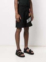 Thumbnail for your product : DSQUARED2 Traveler graphic-print track shorts
