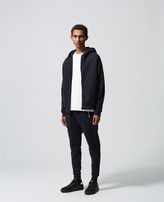Thumbnail for your product : The Kooples Slim blue joggers with zipped pockets & badge