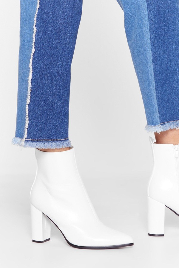 pointed white boots