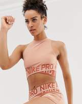 Thumbnail for your product : Nike Training crossover tank in rose gold