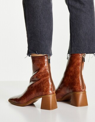 ASOS DESIGN Raider mid heel ankle boots in tan