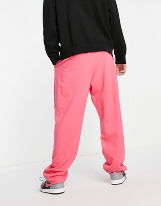 ASOS DESIGN co-ord super oversized joggers with toggle hem in pink