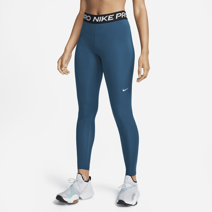 https://img.shopstyle-cdn.com/sim/fb/6d/fb6d634bb6f970dd1e52cedcfc2a57d7_best/womens-nike-pro-mid-rise-mesh-paneled-leggings-in-blue.jpg