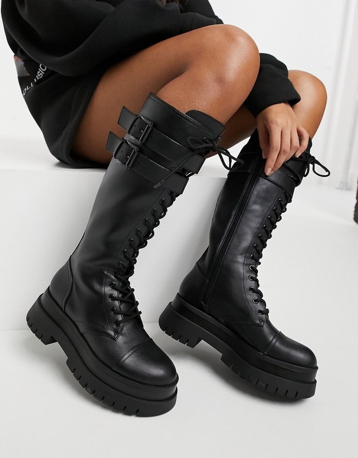 Bershka high leg lace up boot with cleated sole in black - ShopStyle