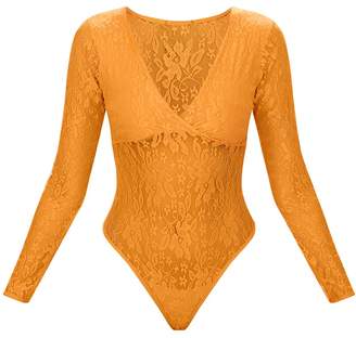 PrettyLittleThing Fuchsia Lace V Neck Long Sleeve Thong Bodysuit