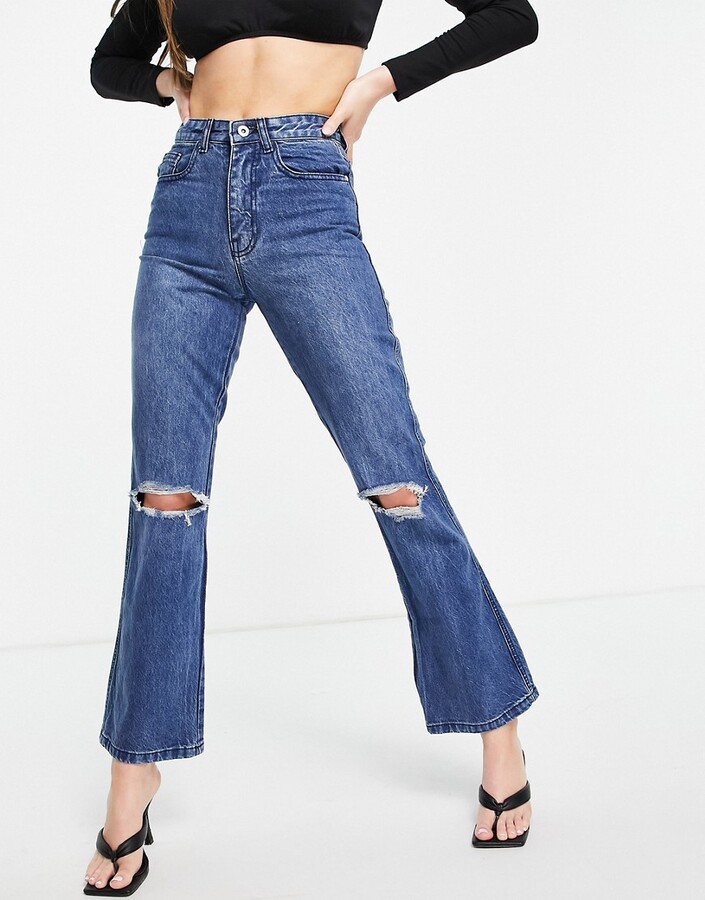 Femme Luxe high waist flares with busted knee in mid blue - ShopStyle