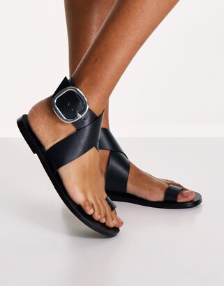 ASOS DESIGN Flyer leather toe loop flat sandals in black