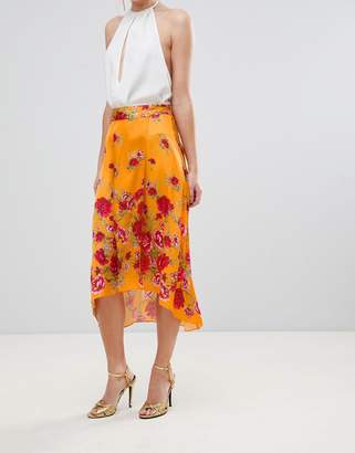 ASOS Design Satin Wrap Midi Skirt In Floral Print