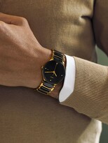 Thumbnail for your product : Rado R30929712 Unisex Centrix Diamond Date Bi-Material Bracelet Strap Watch, Black/Gold
