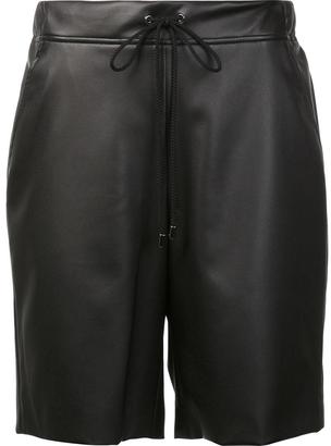 Giamba leather effect lace up shorts - women - Polyester/Polyurethane - 38