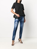 Thumbnail for your product : DSQUARED2 Distressed Skinny Tapered Jeans