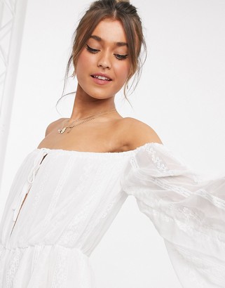 In The Style floaty off shoulder playsuit in white