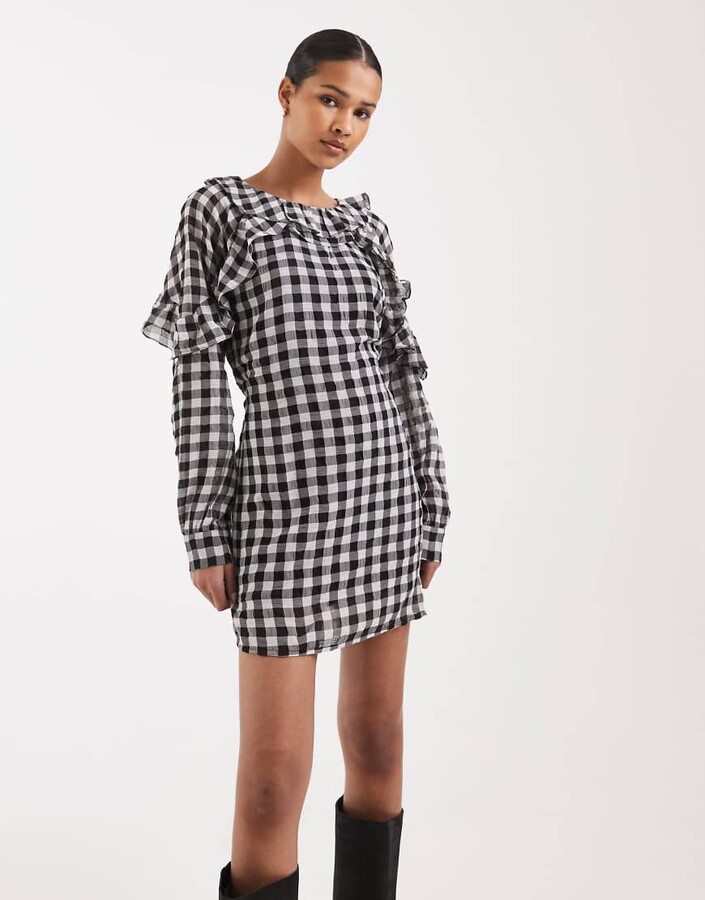 Vero Moda frill detail long sleeve mini dress in black and white gingham