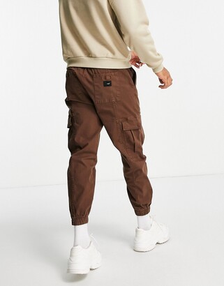 Bershka belted cargo trousers in brown - ShopStyle