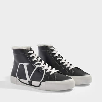Valentino Garavani High-Top Sneakers With Go Logo Detail In Black And White Leather