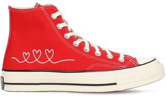 converse with red bottoms