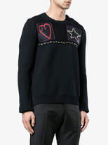 Thumbnail for your product : Valentino patched fisherman knit sweater