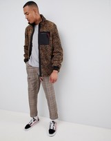 Thumbnail for your product : ASOS DESIGN Tall teddy jacket in zebra print with pocket
