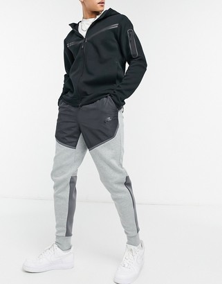 Nike Tech Fleece color block sweatpants in gray S23 - ShopStyle Activewear  Pants