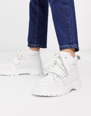 Dr. Martens Zuma with buckle strap flat ankle boots in white