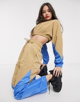 Thumbnail for your product : Collusion cropped nylon track jacket